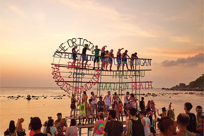 Partygoers dance from dusk until dawn.<br />
