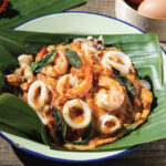 Seafood Hor Mok in Young Coconut